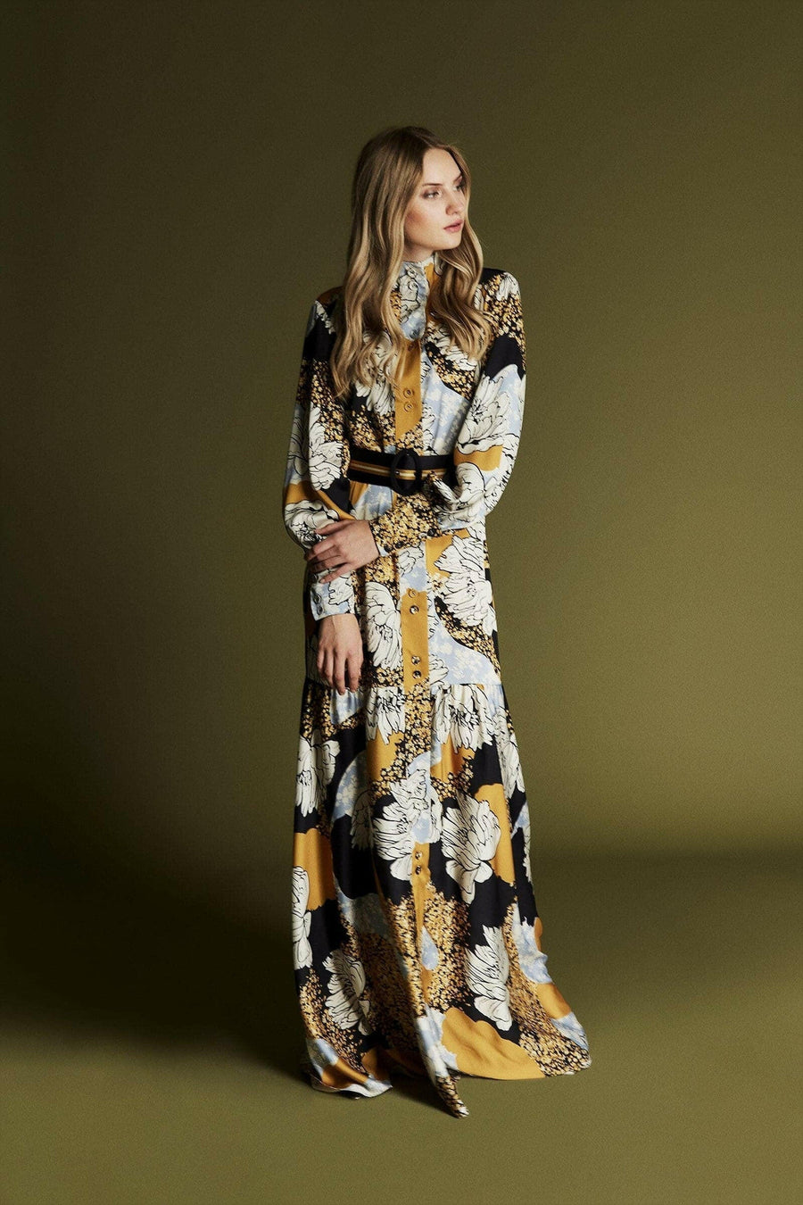 Zaha yellow floral print maxi dress by ByBaano, featuring a flowing design and vibrant floral pattern.