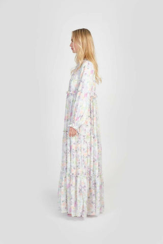 White Maria women's modest dress by ByBaano, featuring long sleeves and elegant, flowing fabric for a graceful look.