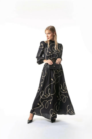 ByBaano Alexia Long Maxi Dress with long sleeves, elegant design, and flowing fabric perfect for stylish occasions.