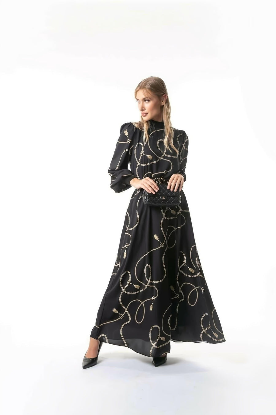 ByBaano Alexia Long Maxi Dress with long sleeves, elegant design, and flowing fabric perfect for stylish occasions.