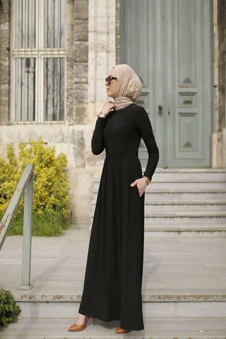 ByBaano Elena Jersey Maxi Dress with side pocket, flowy fabric, and a stylish, comfortable design perfect for casual wear.