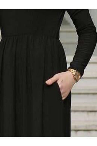 ByBaano Elena Jersey Maxi Dress featuring a side pocket, lightweight fabric, and a flowing silhouette for casual or semi-formal wear.
