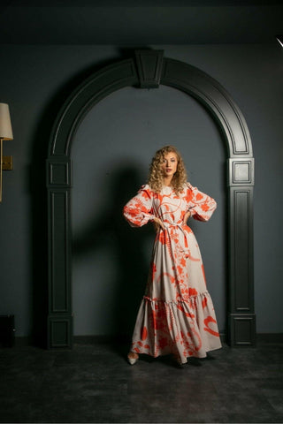 ByBaano Susan Long Maxi Dress, flowy and elegant maxi dress with a fitted bodice and full-length skirt, shown on a model.