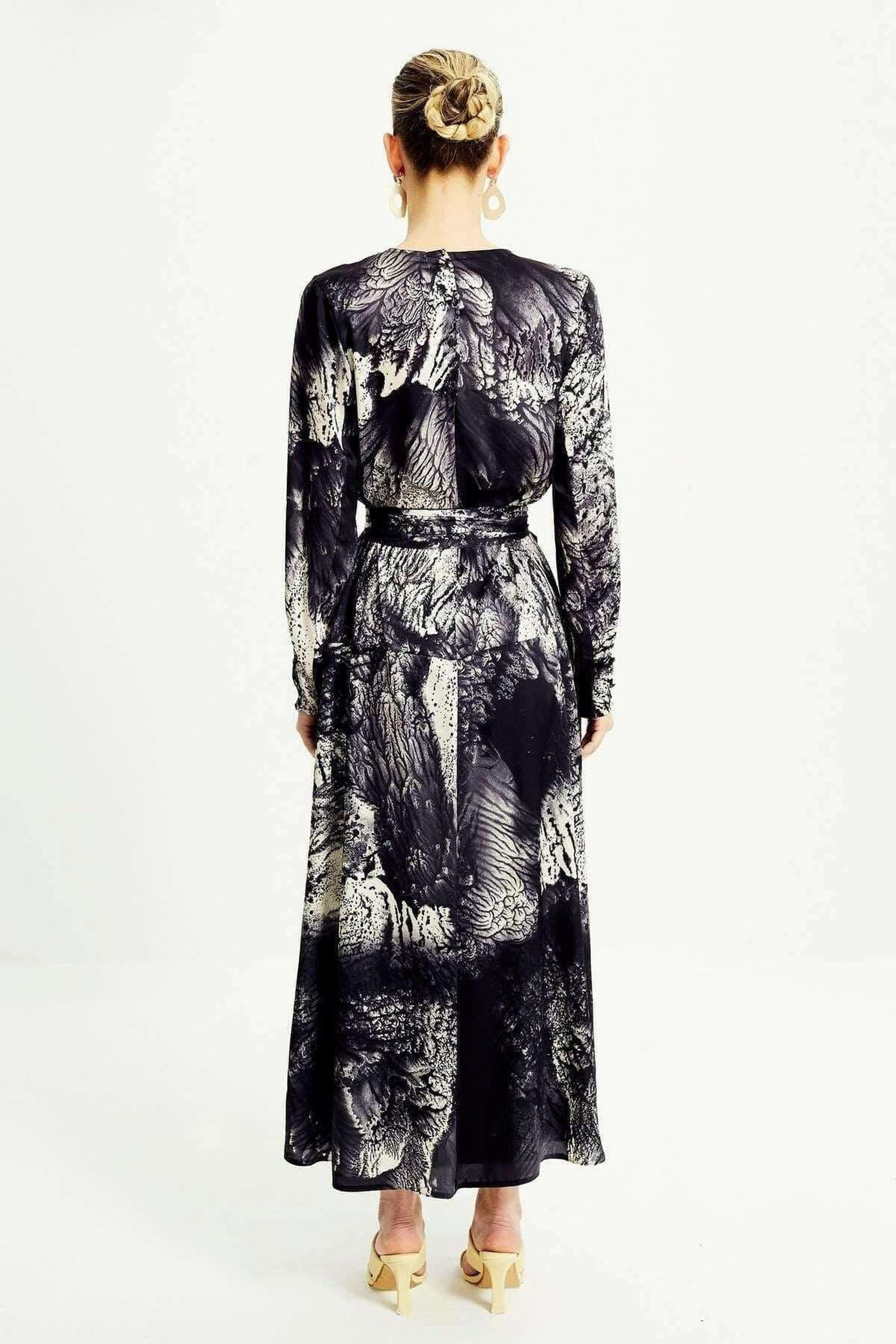 Gray ByBaano long maxi dress with sleeves and side pockets, featuring a comfortable and stylish polyester design.