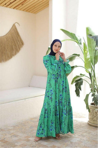 ByBaano Mira Maxi Dress featuring flowy fabric, sleeveless design, and elegant length perfect for summer or casual wear.