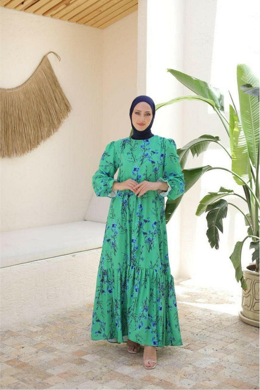 ByBaano Mira Maxi Dress displayed on a hanger, featuring a flowing fabric and elegant design for stylish summer wear.