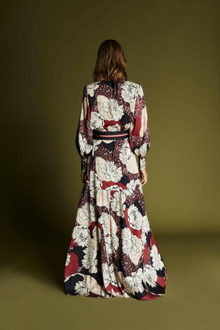 ByBaano Olivia maxi dress with long sleeves, flowing fabric and elegant design perfect for casual or formal wear.