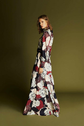 ByBaano Olivia Maxi Dress with long sleeves, flowing fabric, and elegant design, shown in a full-length view.