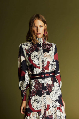 ByBaano Olivia Maxi Dress with long sleeves, flowing fabric, and elegant design perfect for casual or formal wear.