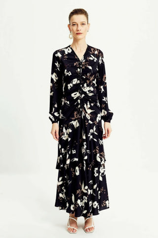 ByBaano Amelia Polly midi dress in lightweight fabric, perfect for summer, featuring a stylish, flowy design.