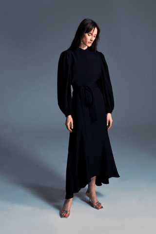 ByBaano Mia Black Midi Dress for women, showcasing a stylish midi-length dress with a fitted silhouette and elegant design.