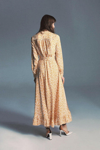 ByBaano Nora Maxi Dress in soft fabric, featuring a flowing silhouette and elegant design, perfect for casual or semi-formal wear.