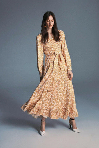 ByBaano Nora Maxi Dress in soft fabric, featuring a flowing silhouette and elegant design, perfect for stylish occasions.
