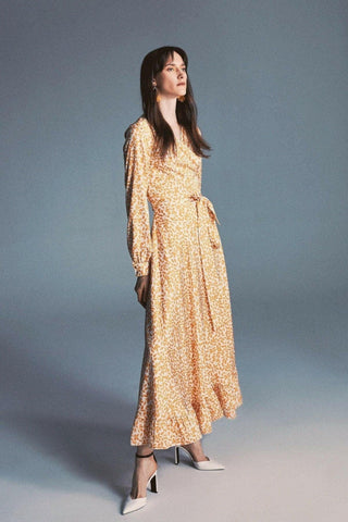ByBaano Nora Maxi Dress in soft fabric, featuring a flowing silhouette and elegant design perfect for casual or formal wear.