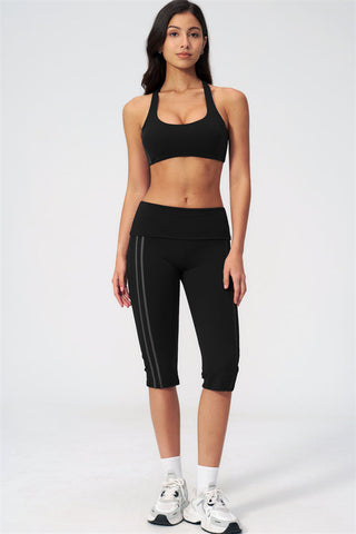 The Evoke Racerback Sports Bra Capri Leggings 2-Piece Set