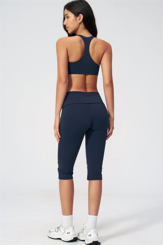 The Evoke Racerback Sports Bra Capri Leggings 2-Piece Set