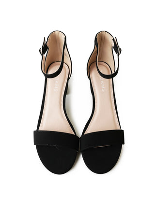 Black nubuck Daisy heels by J.Adams with stylish pointed toes and elegant ankle straps, showcased from a side angle.