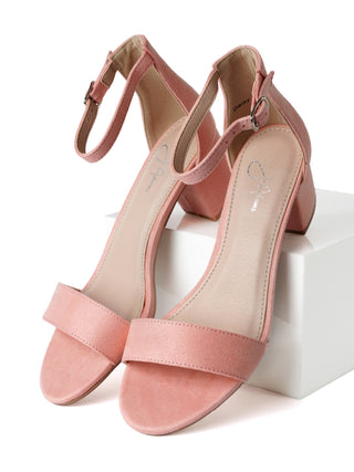 J.Adams Daisy blush suede heels with pointed toes and slim stiletto heels, showing the elegant side view of the footwear.