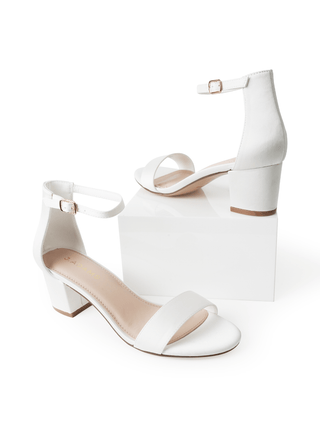 White satin Daisy heels by J.Adams featuring elegant design and pointed toes, perfect for formal occasions.