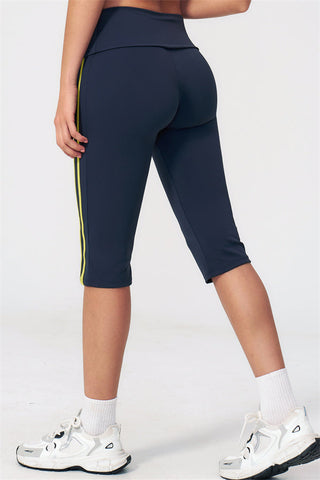 The Evoke Racerback Sports Bra Capri Leggings 2-Piece Set