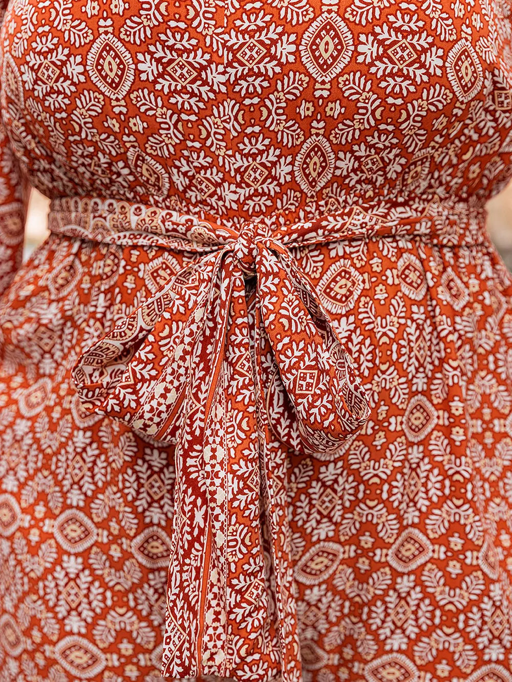 Plus Size Printed V-Neck Tie Front Balloon Sleeve Jumpsuit - Glamourous Grace