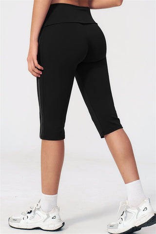 The Evoke Racerback Sports Bra Capri Leggings 2-Piece Set