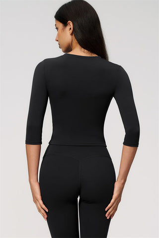 The Natalia Half-Sleeve Top Capri Leggings 2-Piece Set