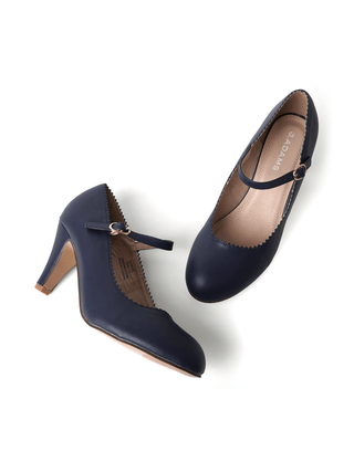 Navy blue J.Adams heels with honey-colored accents, stylish pointed toe, and sleek stiletto heel on a white background.