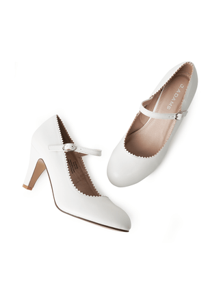 White Honey heels by J.Adams featuring a sleek design with a pointed toe and stiletto heel.