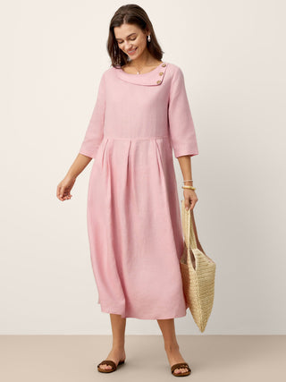 LINTICO linen crescent neck maxi dress with decorative buttons, waist pleats, and flowing design, perfect for elegant summer wear.