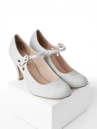 Silver glitter heels from J.Adams Pixie collection, featuring a stylish design with sparkling fine glitter accents.