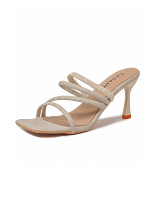 Beige Sadie heels by J.Adams with pointed toes and stiletto heels, displayed on a neutral background.