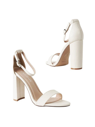 J.Adams Shirley cream lizard heels showing pointed toe and elegant ankle strap on a neutral background