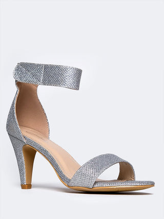 Silver glitter heels by J.Adams featuring a sleek design with a stylish heel for elegant footwear.