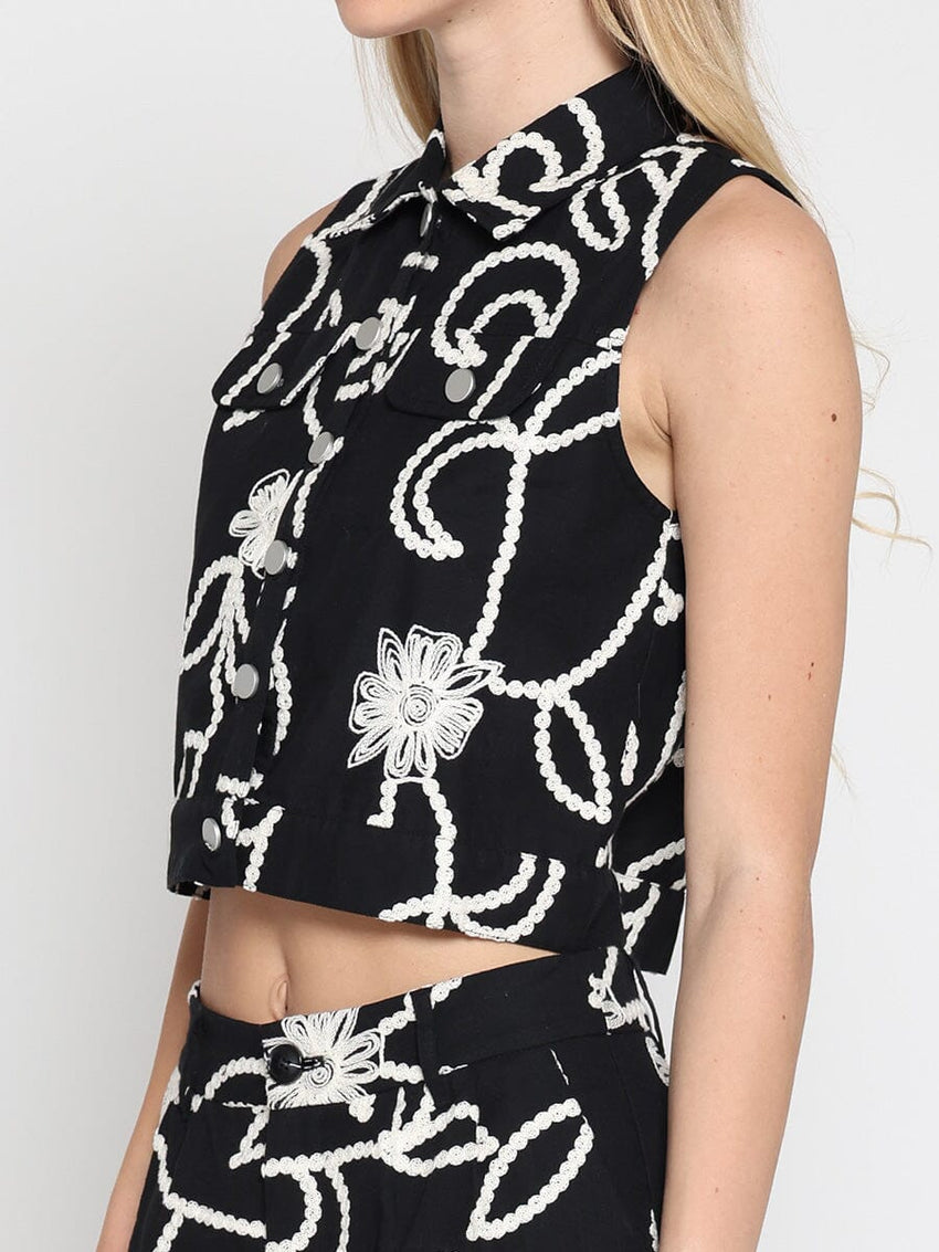 Sleeveless embroidered button down vest