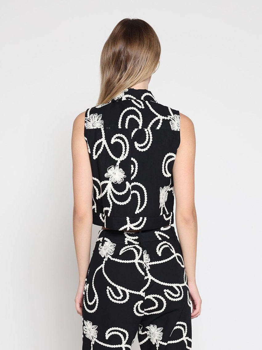 Sleeveless embroidered button down vest