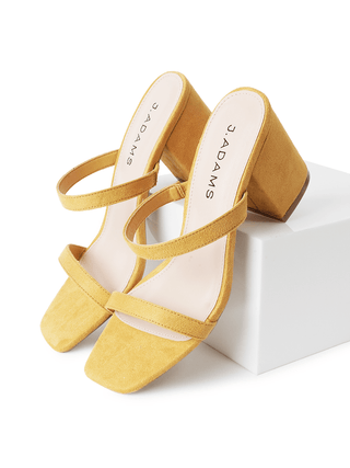 Yellow suede heels from J.Adams Stormi collection, featuring elegant pointed toes and stylish stiletto heels.