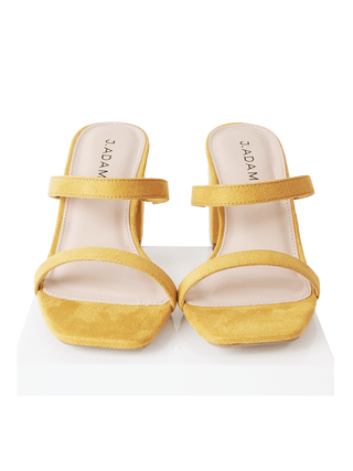 Yellow suede heels from J.Adams Stormi collection, featuring a stylish and elegant design with a pointed toe and stiletto heel.