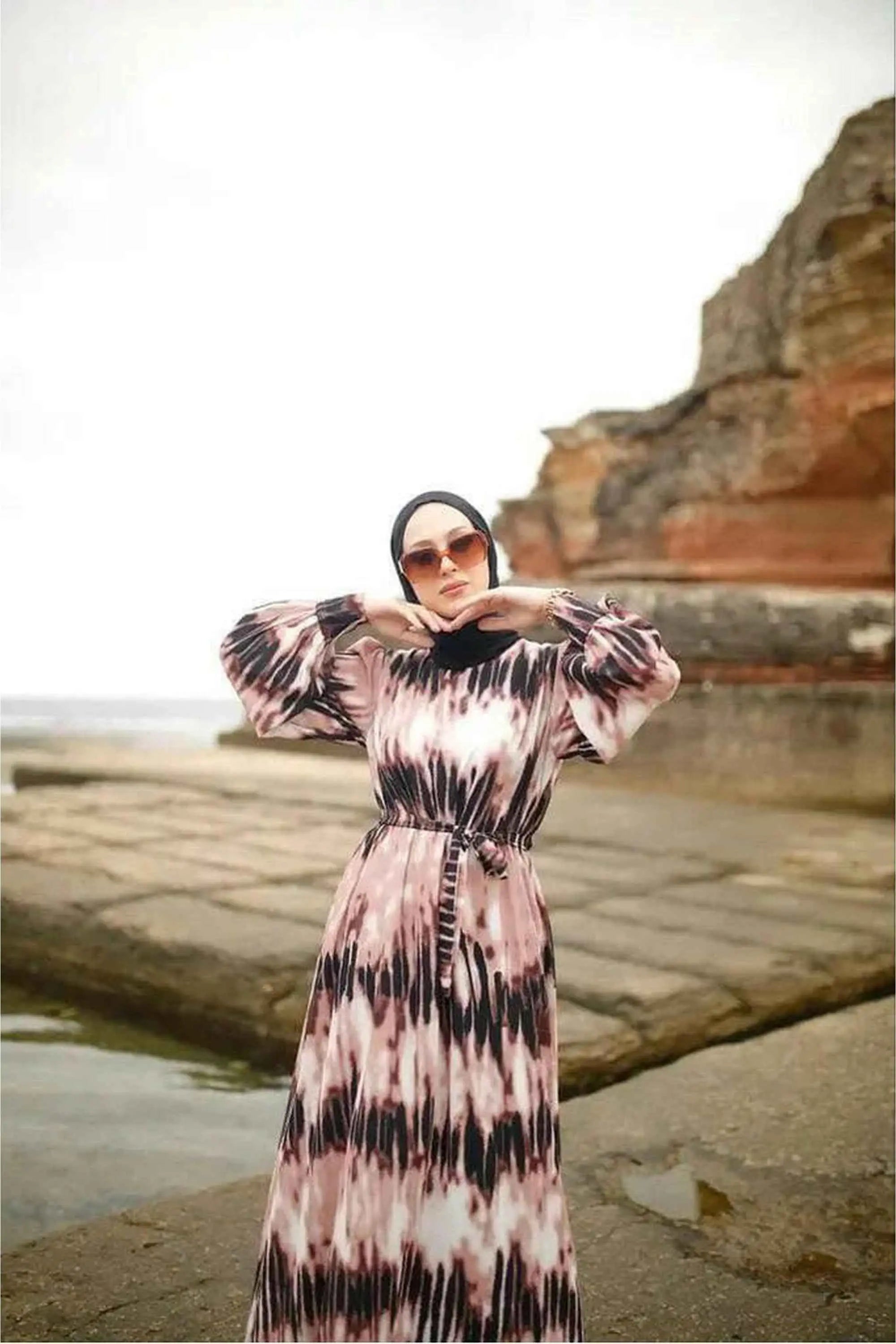 Long Louisiana maxi dress with long sleeves by ByBaano, featuring a modest, flowing design perfect for elegant casual wear.
