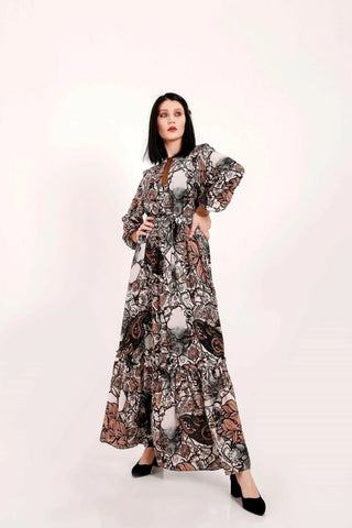 BY Baano paisley maxi dress with long sleeves, flowing bohemian style, featuring intricate paisley patterns and a relaxed fit.